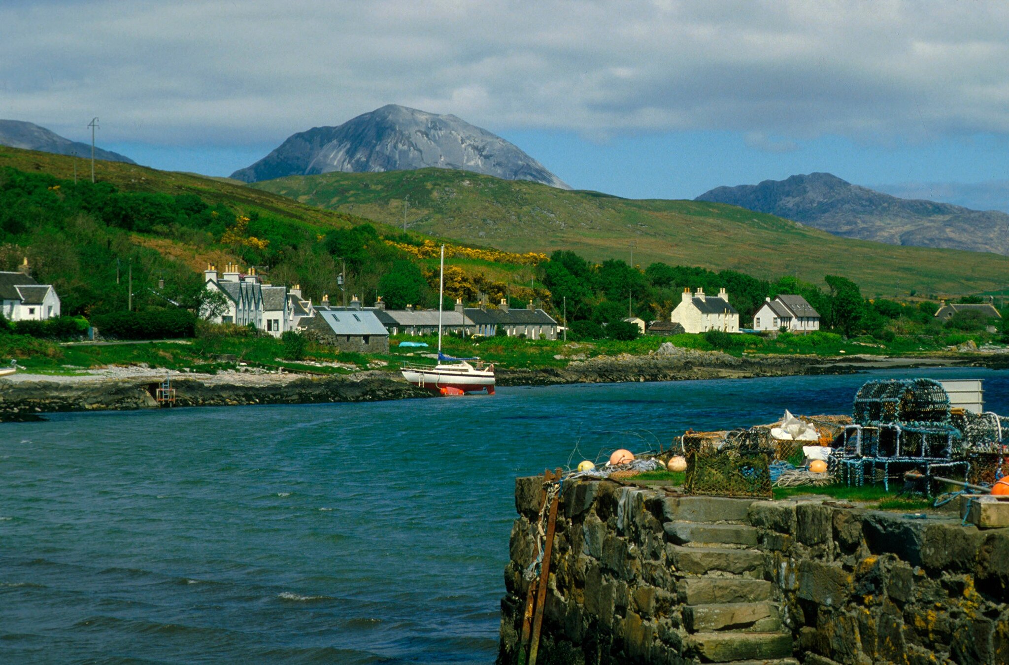 Looking across the pier to the small port of Craighouse on the east coast of the island.