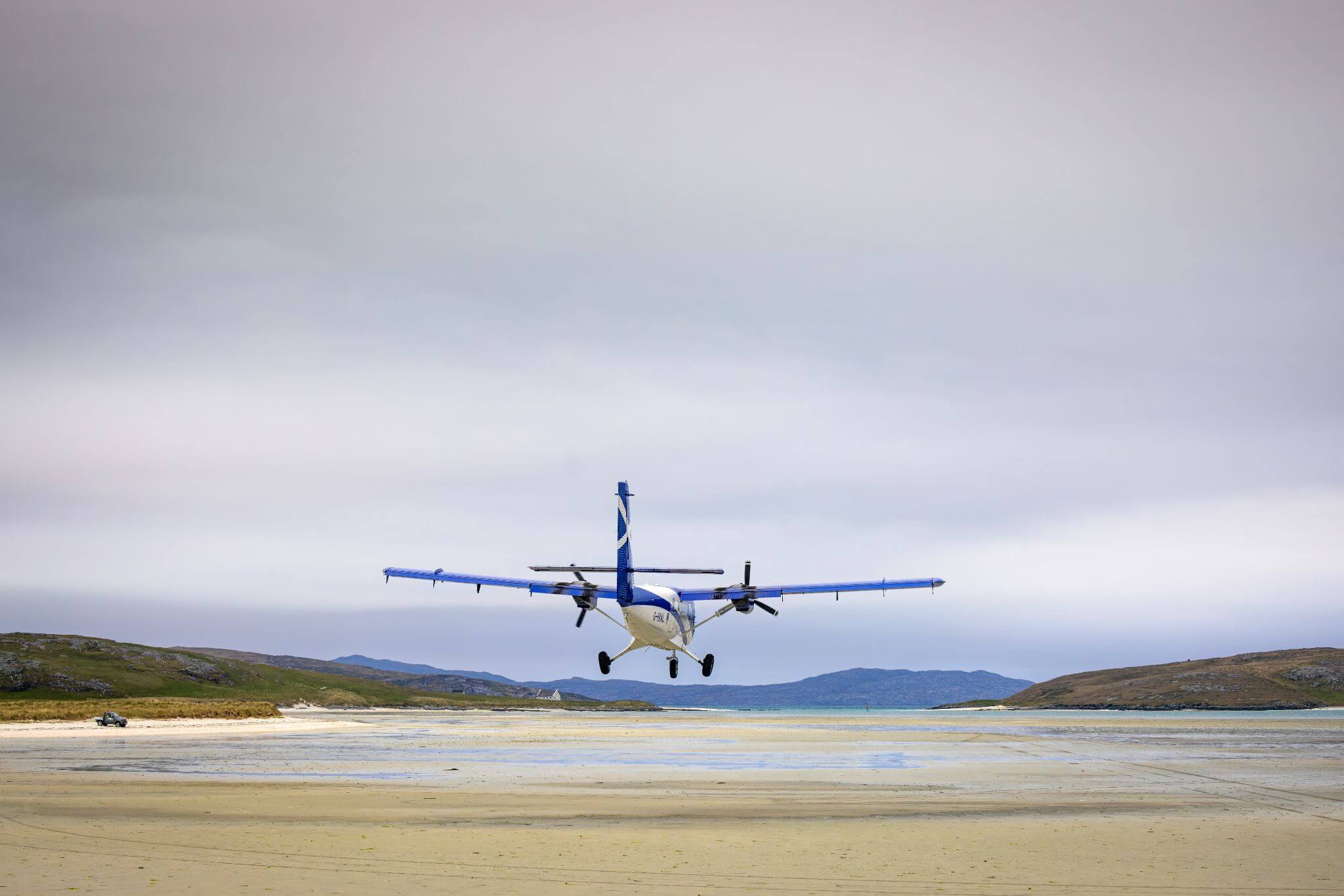 Plane landing at Barra Airport