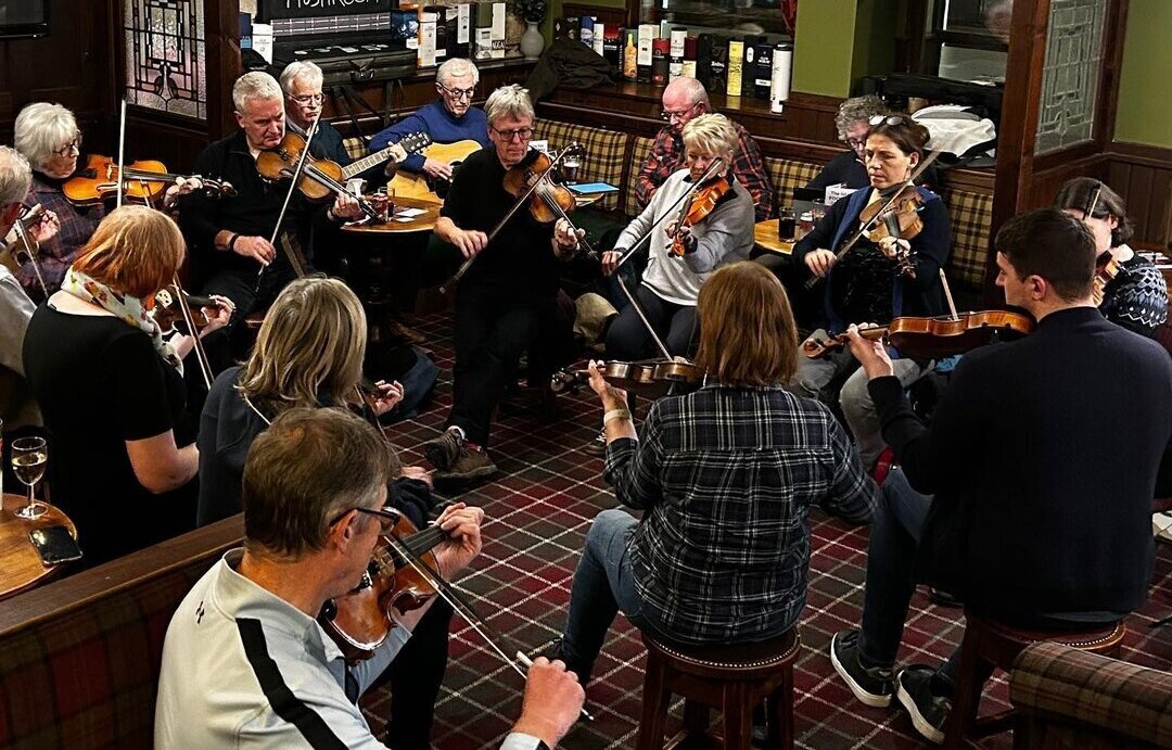 A trad music session underway at the Islay Inn